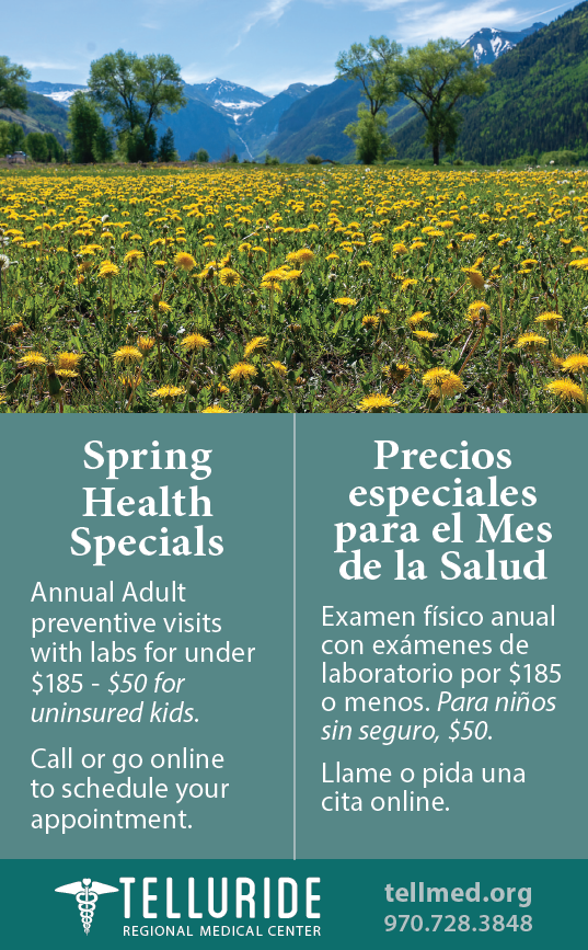 A field of yellow flowers with mountains in the background highlights TMC’s Spring Health Month specials, advertised in both English and Spanish by Telluride Regional Medical Center.